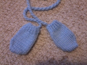 Simple mittens, simple pattern, simply fun (especially the twist cord) . . .